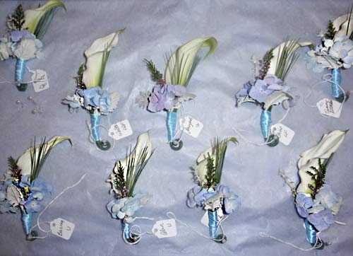 Autumn boutonnieres were composed of periwinkle lavender blue hydrangea 